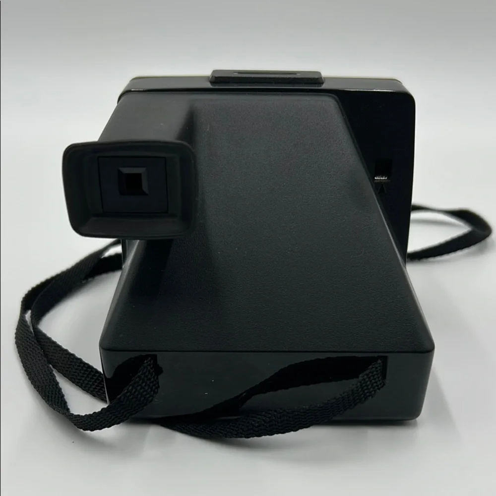 Vintage Polaroid Black and White Film Camera with Instant Photo Feature